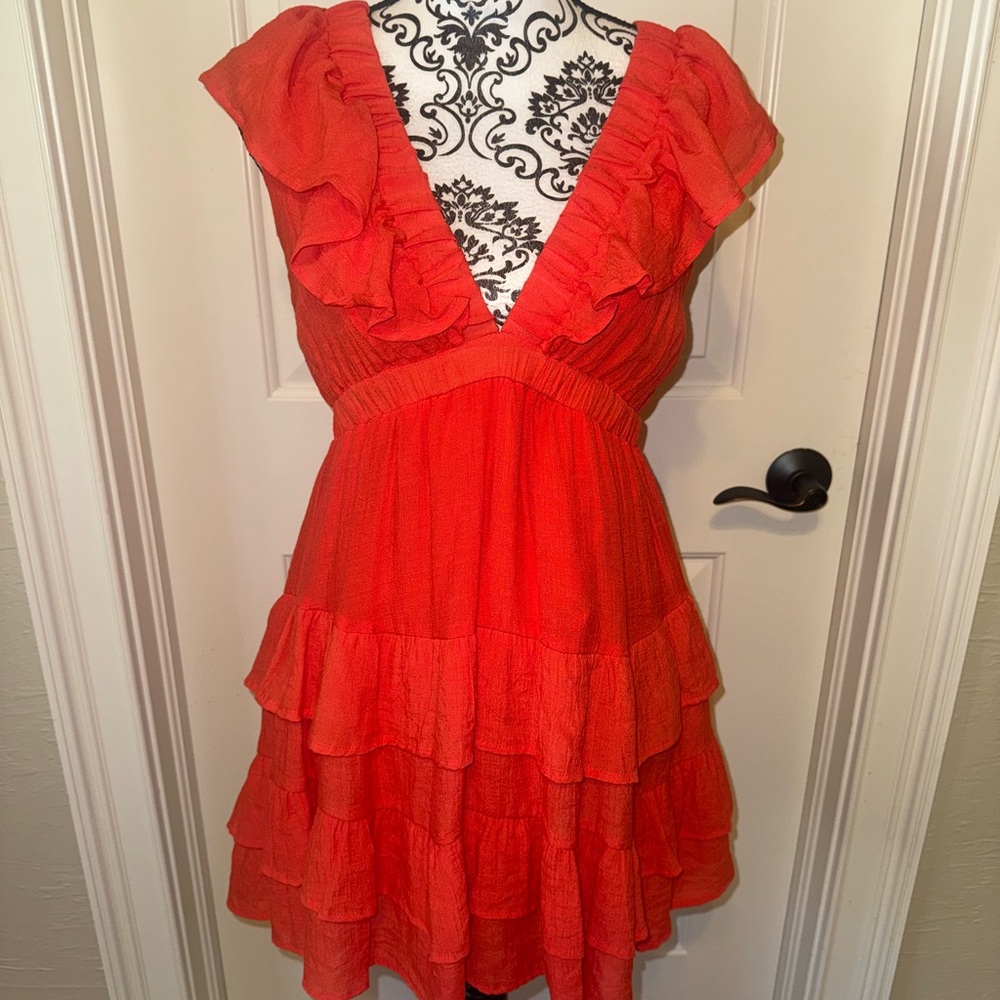 Red Ruffled Mini Dress with Flutter Sleeves and V-Neck